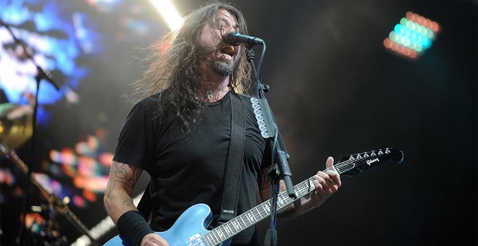 Watch Dave Grohl invite a “repeat offender” onstage to drum with the band
